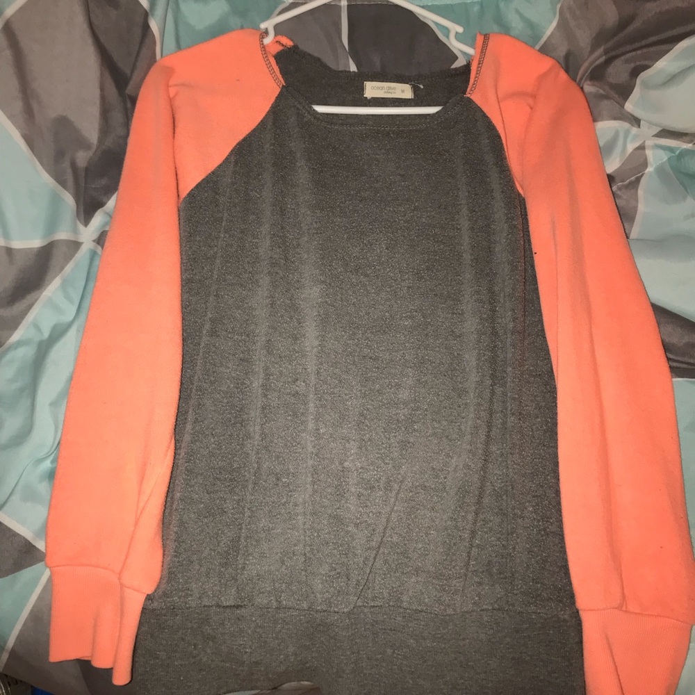 orange and grey long sleeve